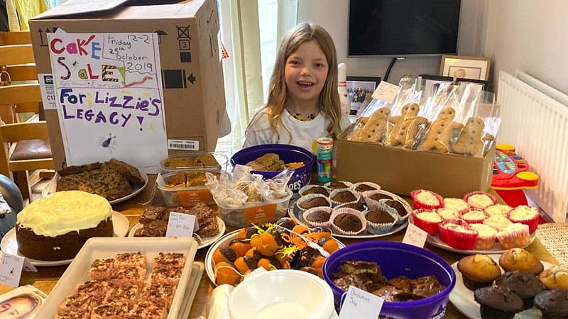 Daisy with all her delicious cakes and biscuits